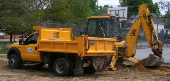 Backhoe and Dump Truck