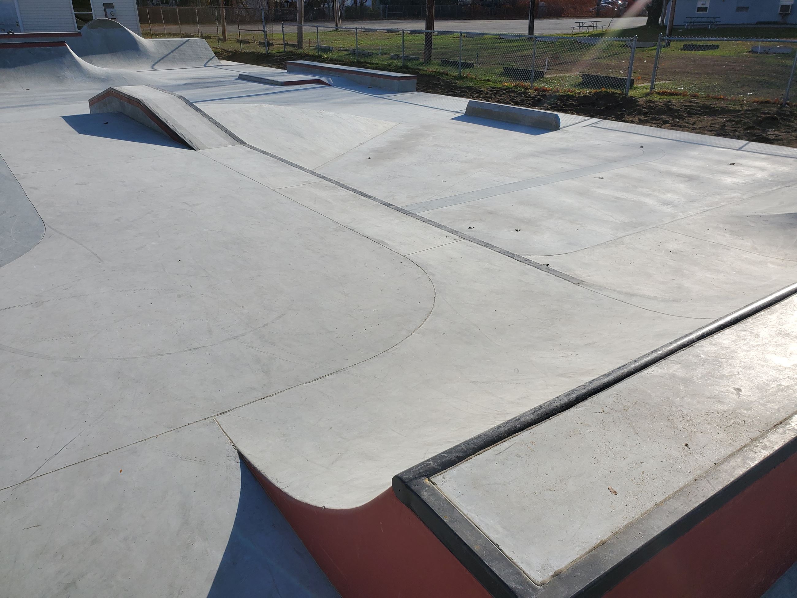 The quarter pipe looks out over 6 of the features in the skate park